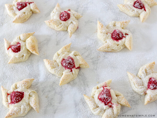 baked raspberry puff pastries on the the counter