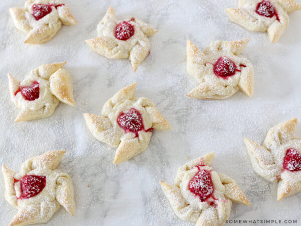 baked raspberry puff pastries on the the counter