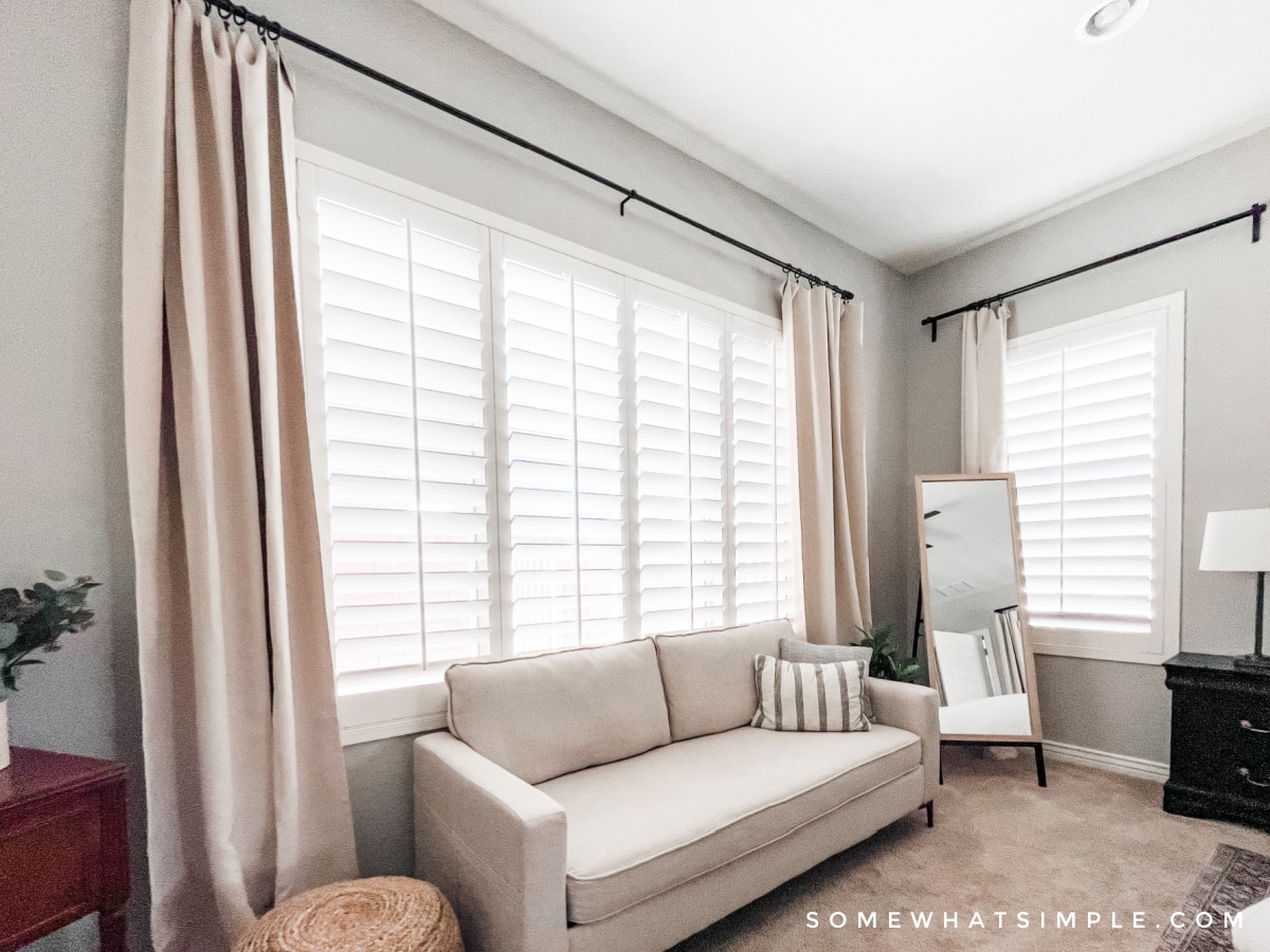 curtains hanging in a master bedroom