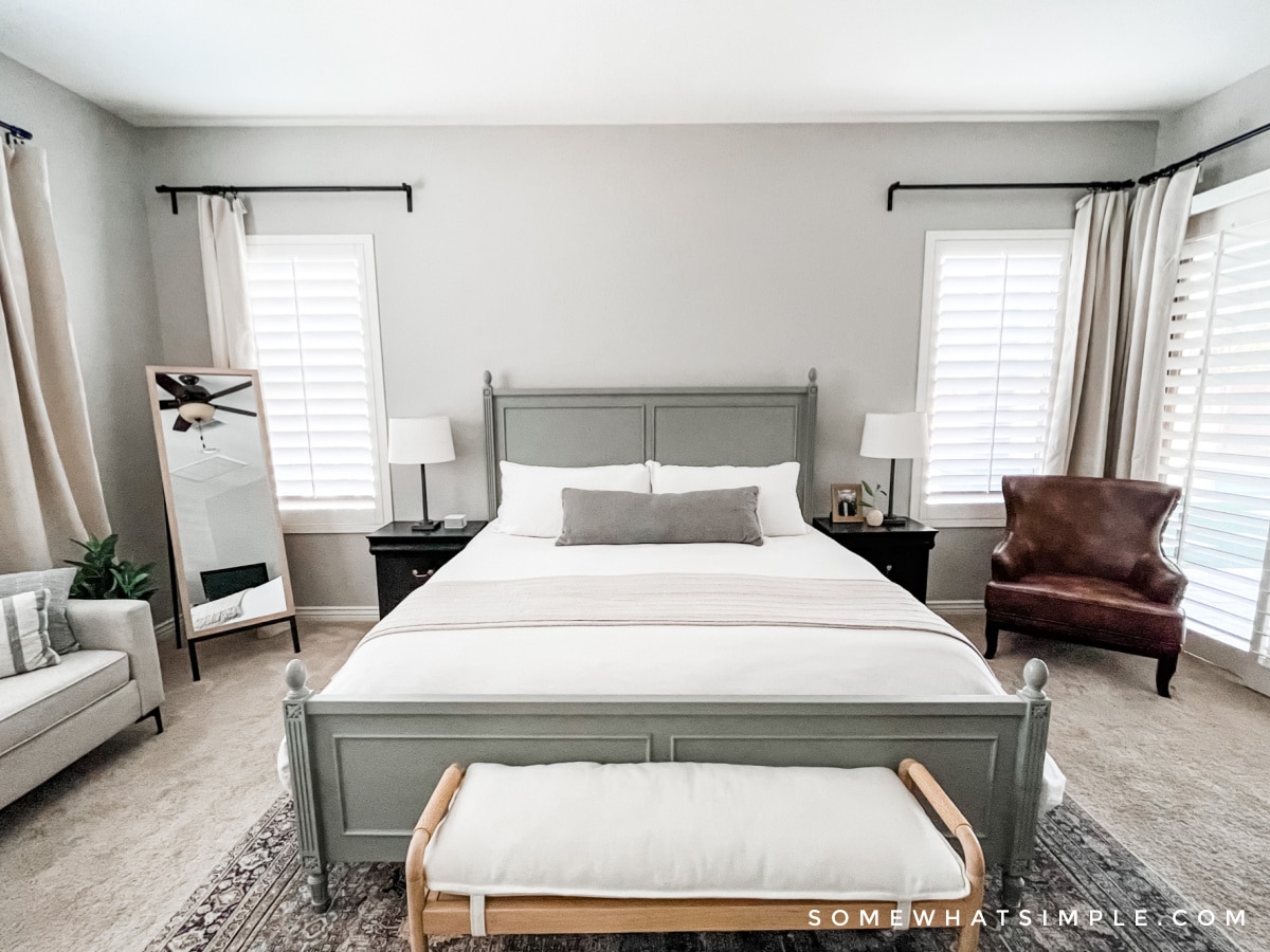 image looking at a king sized bed in a primary bedroom