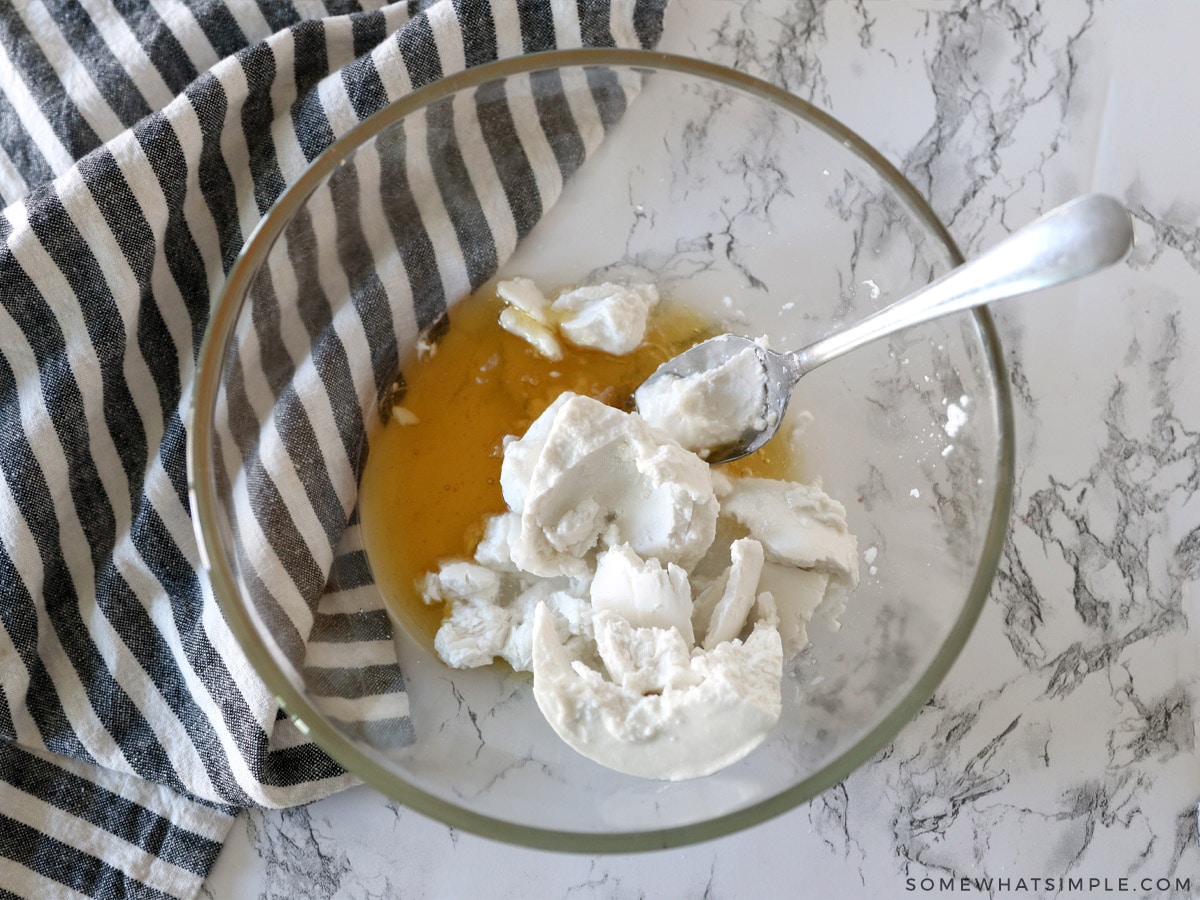 mixing coconut cream in a glass bowl