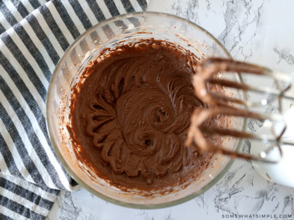 whipped chocolate frosting in a mixing bowl