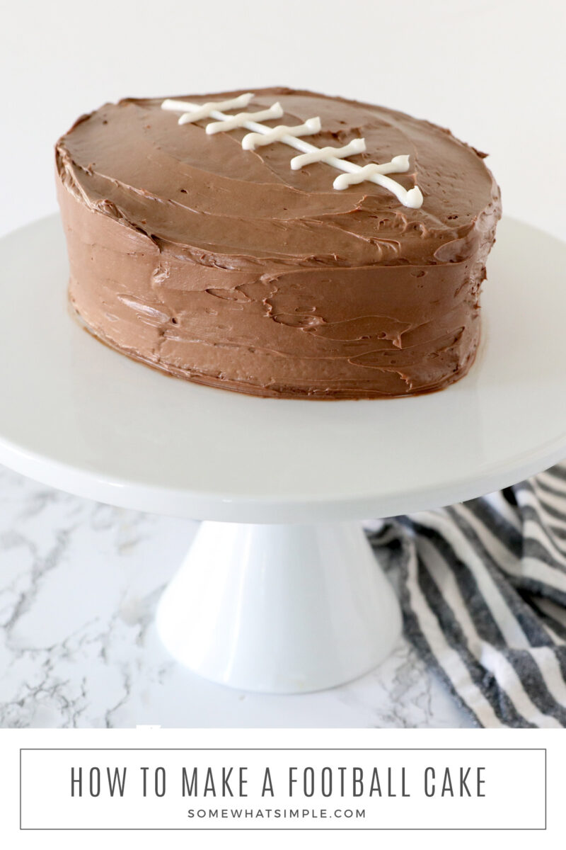 long image of a football cake on a white cake stand