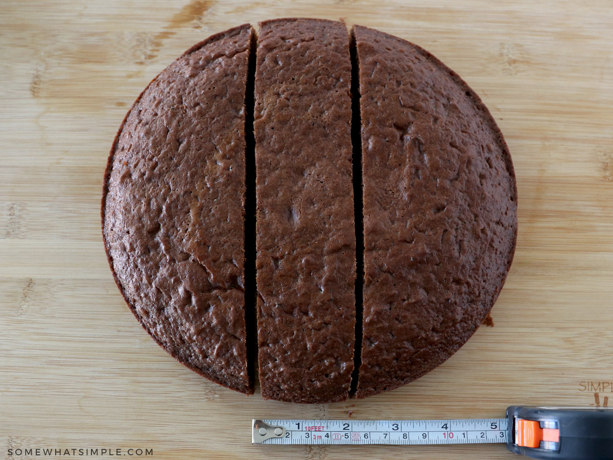 cutting a round cake in the center