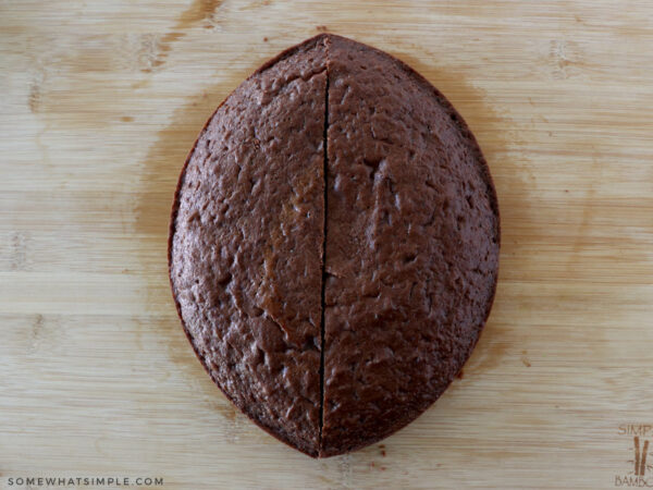 pushing two pieces of cake together to make a football