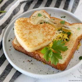 heart shaped toast with an egg in the middle