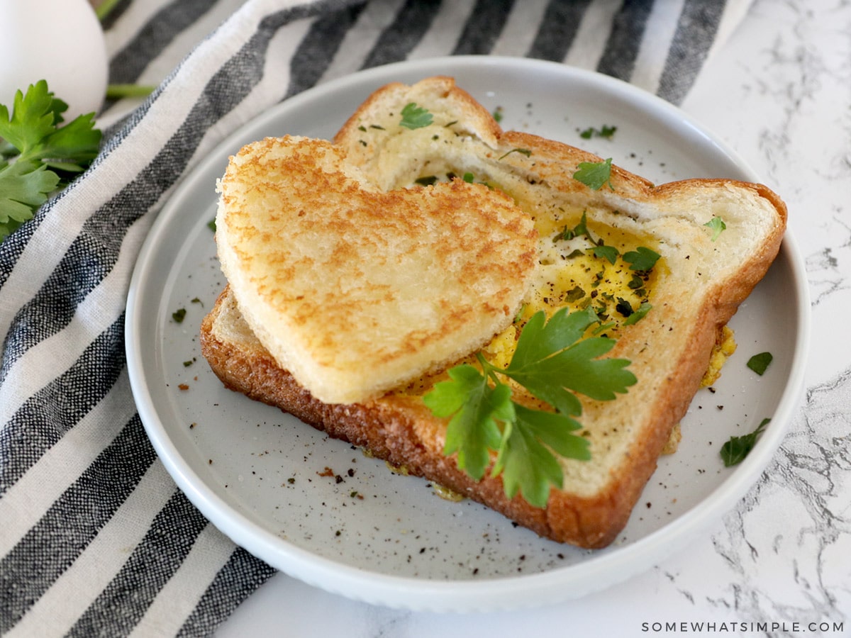 heart shaped toast with an egg in the middle