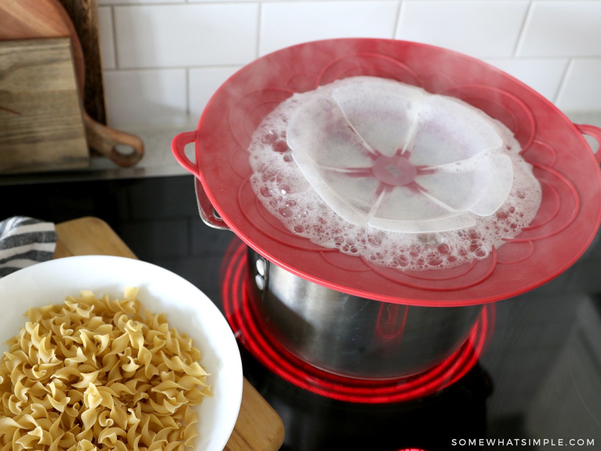 a silicone disc on top of a boiling pot of water