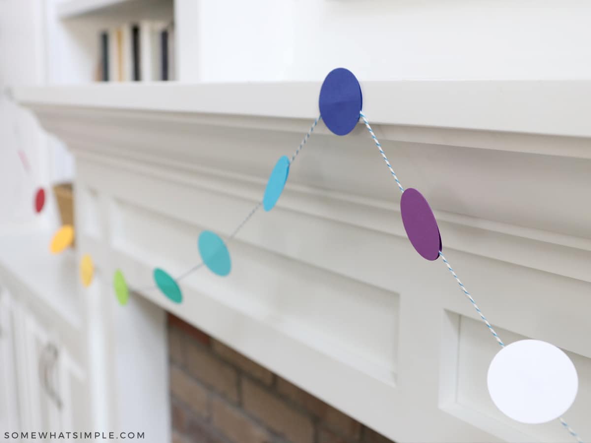 hanging circle banner on a mantle