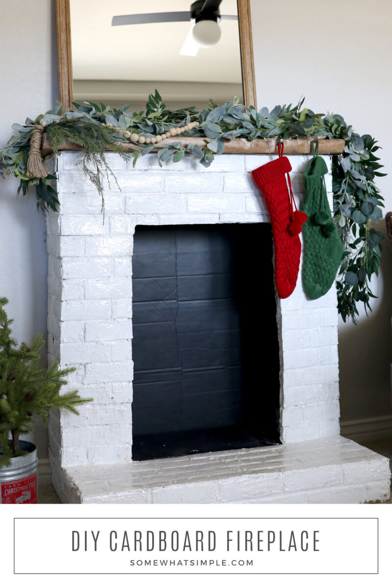 long image of a faux fireplace with stocking hanging from it