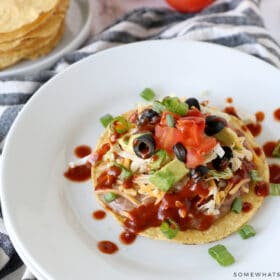 over head shot of a spanish tostada with all the toppings