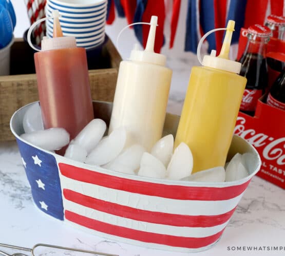 ketchup, mustard, and mayo in a bucket with ice