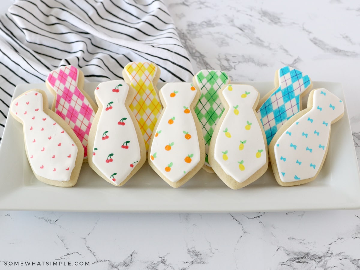 a small platter of father's day tie cookies