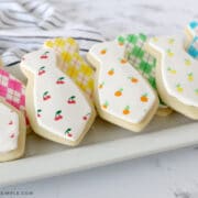 father's day tie cookies on a white platter