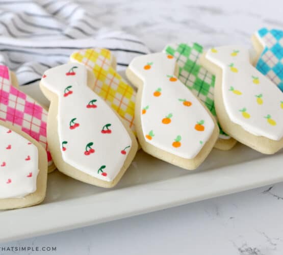 father's day tie cookies on a white platter