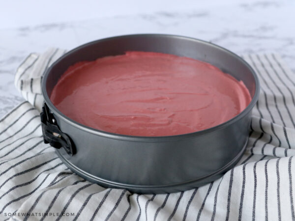 red velvet batter in a pan ready to cook