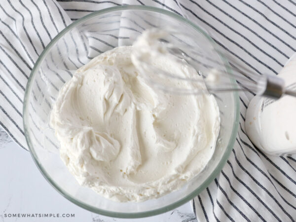 making whipped cream for a cheesecake