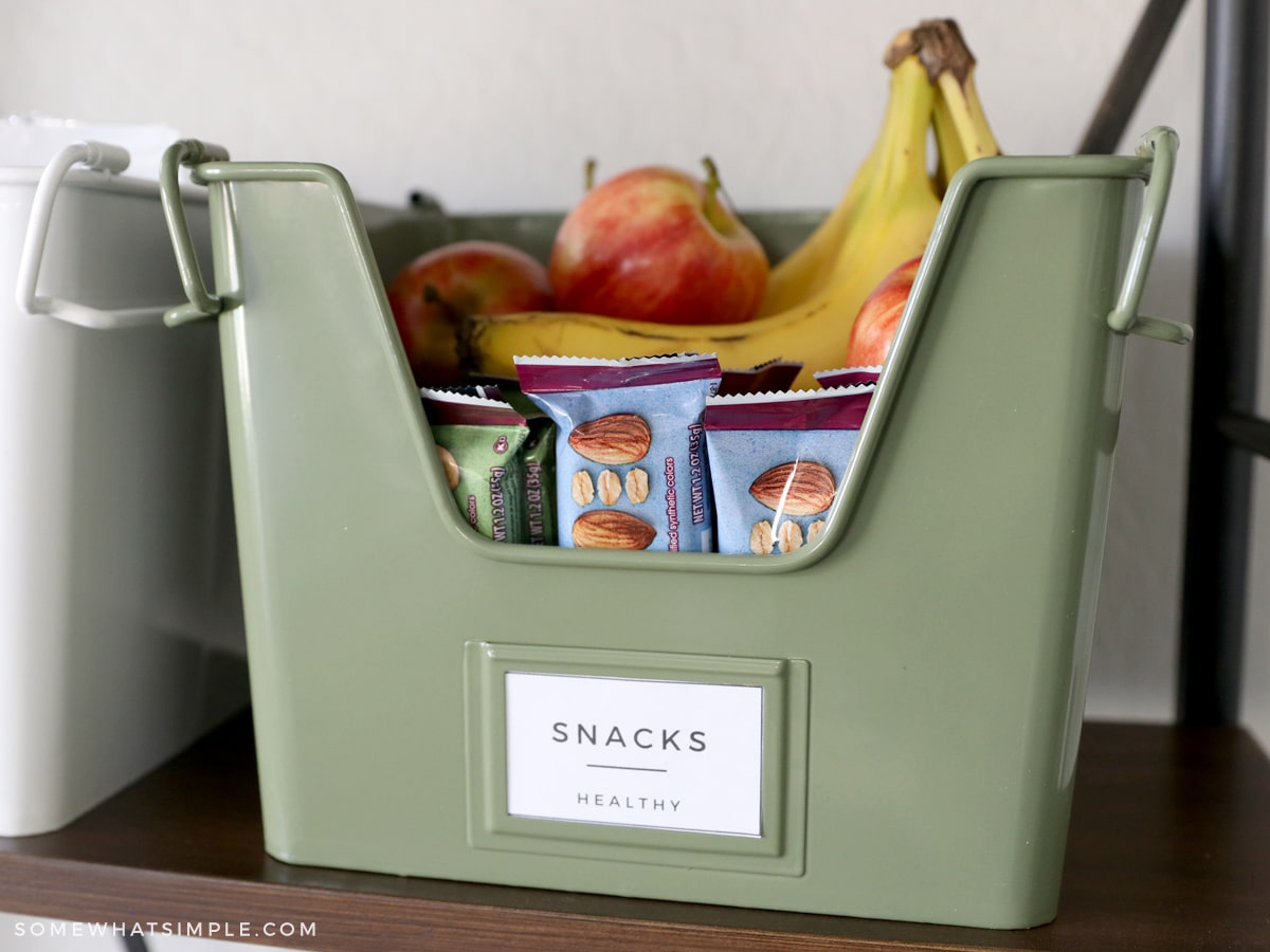 green metal bin with snacks inside it