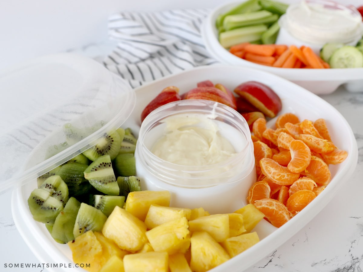 fruits cut up in a snack tray