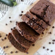 sliced zucchini bread surrounded by chocolate chips
