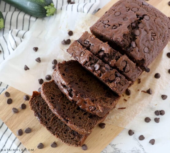 sliced zucchini bread surrounded by chocolate chips