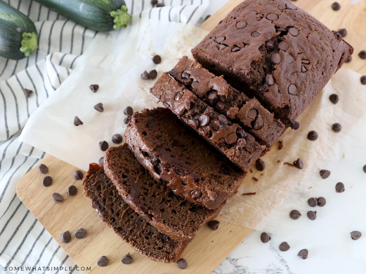 sliced zucchini bread surrounded by chocolate chips