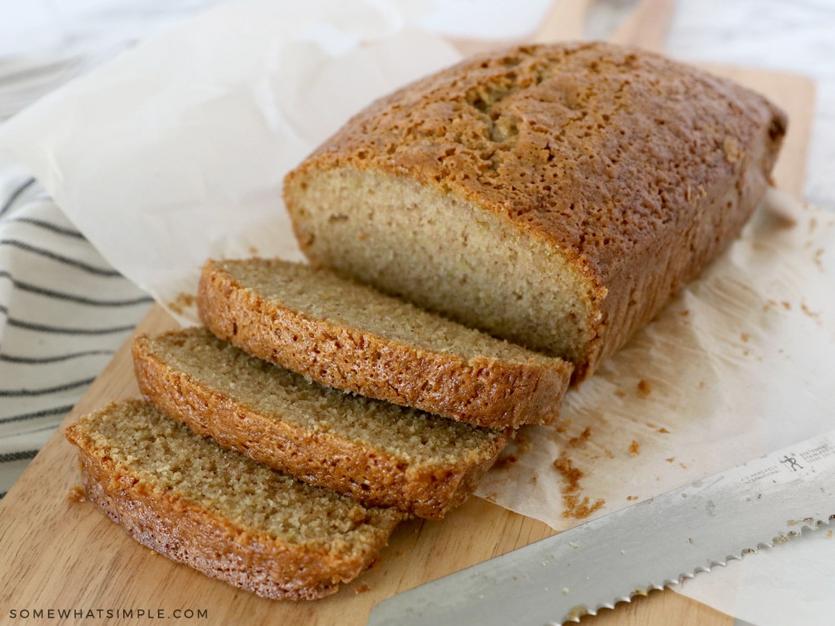 loaf of zucchini bread with half of it sliced