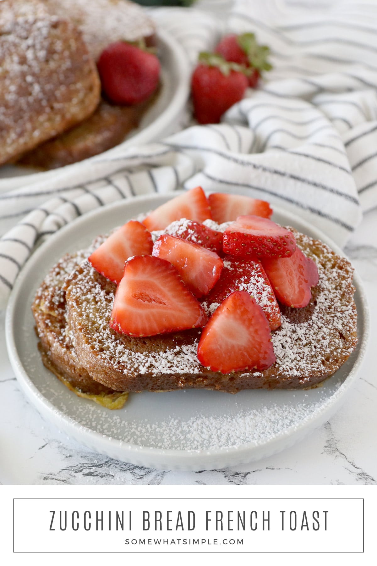 With homemade zucchini bread, berries, and whipped cream, this Zucchini Bread French Toast is a delicious summer twist on a favorite breakfast dish. via @somewhatsimple