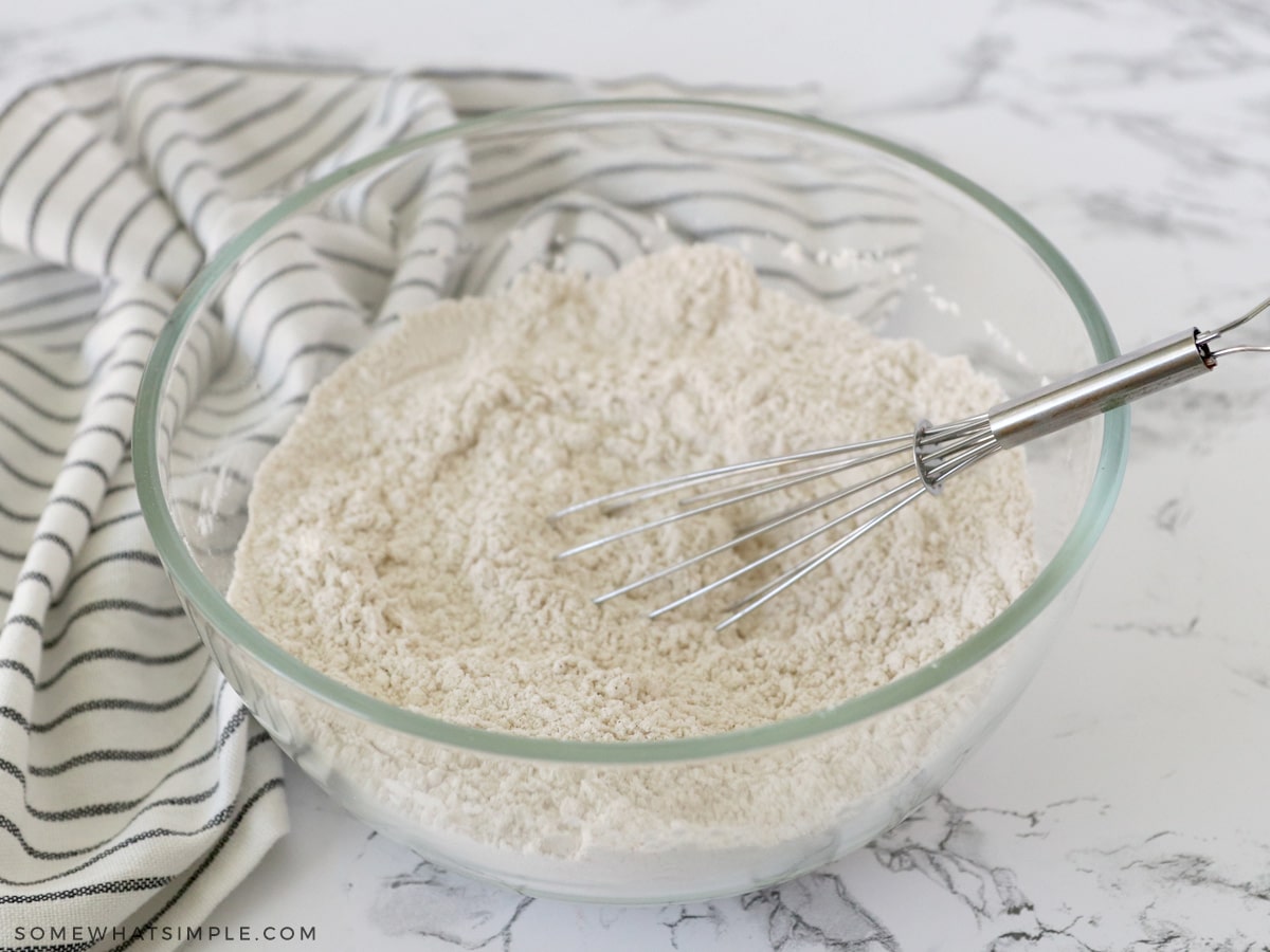 mixing dry ingredients for zucchini bread