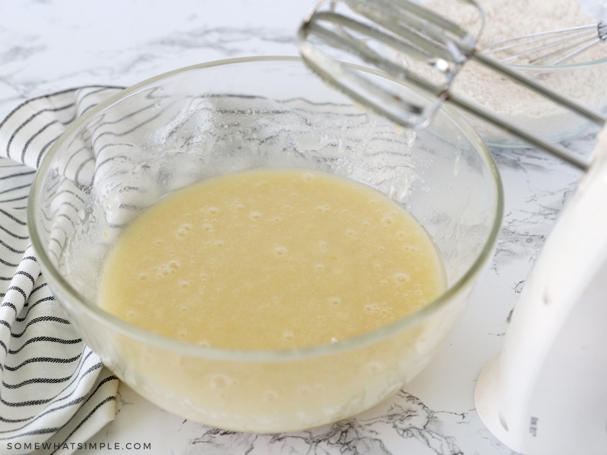 mixing wet ingredients for zucchini bread