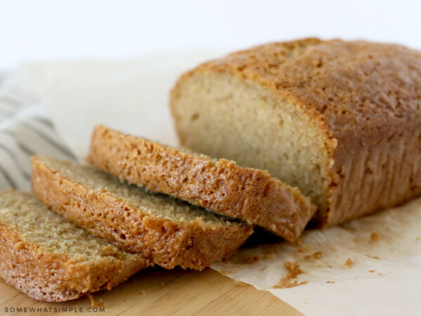 slicing a loaf of zucchini bread