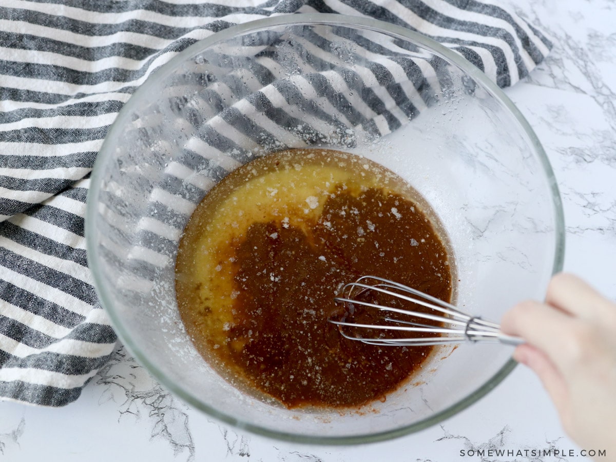 mixing butter with melting chocolate