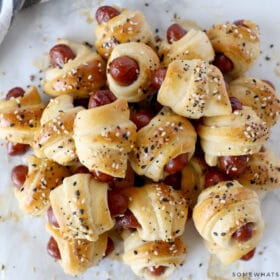 pile of pigs in a blanket on a white counter