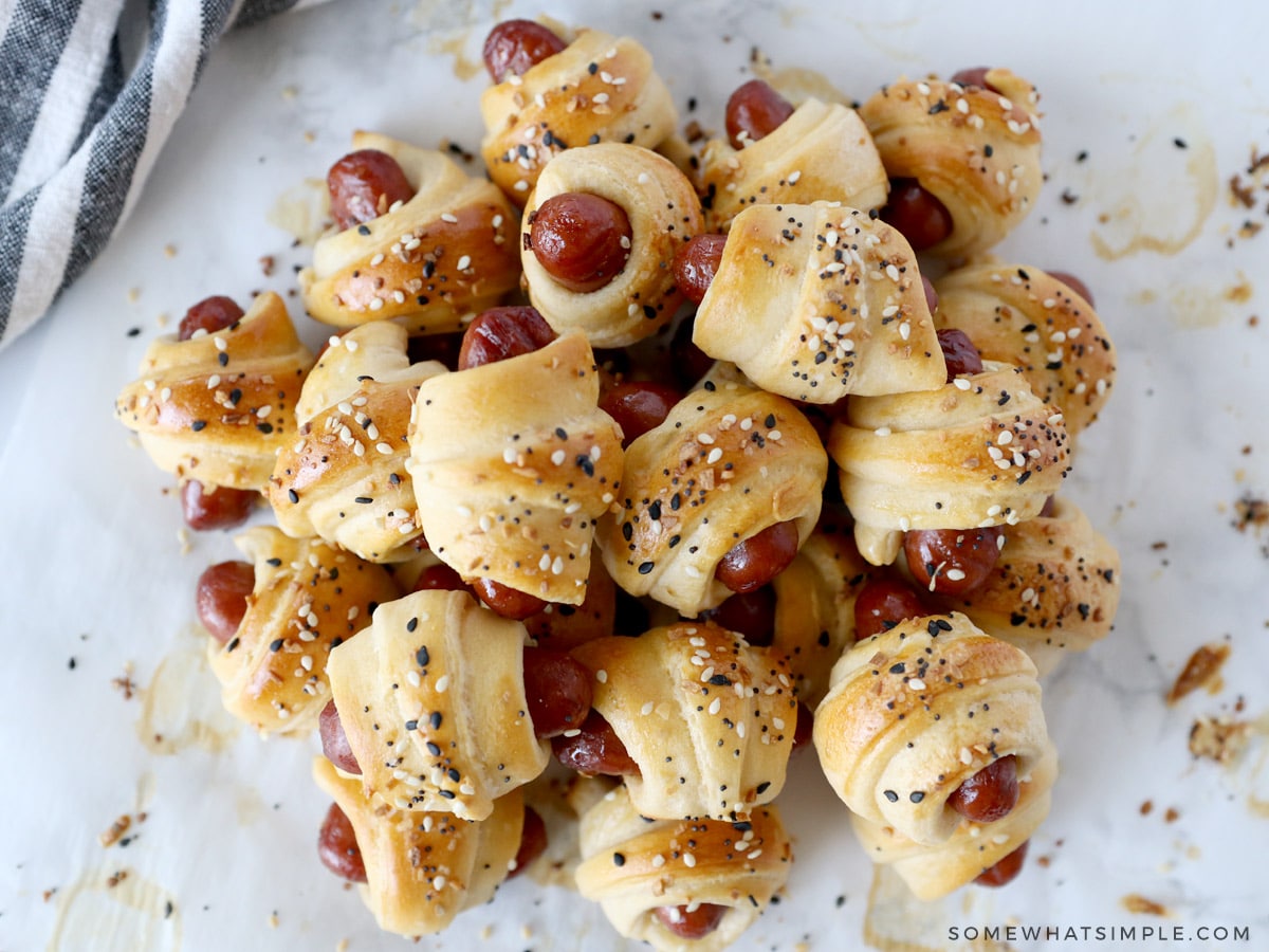 pile of pigs in a blanket on a white counter