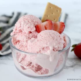 strawberry cheesecake frozen yogurt in a glass dish