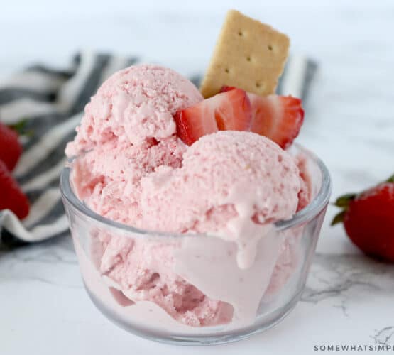 strawberry cheesecake frozen yogurt in a glass dish
