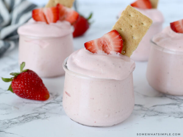 soft strawberry frozen yogurt in a glass dish