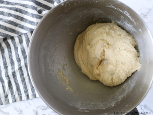 ball of dough in a mixing bowl