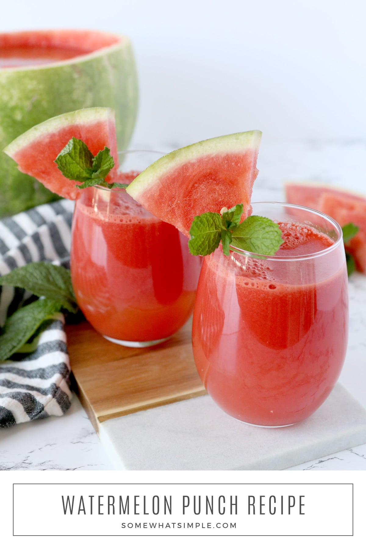 This EASY watermelon punch is perfect for hot summer days. Make this refreshing drink even more delicious by serving it inside the watermelon you used to make it! via @somewhatsimple