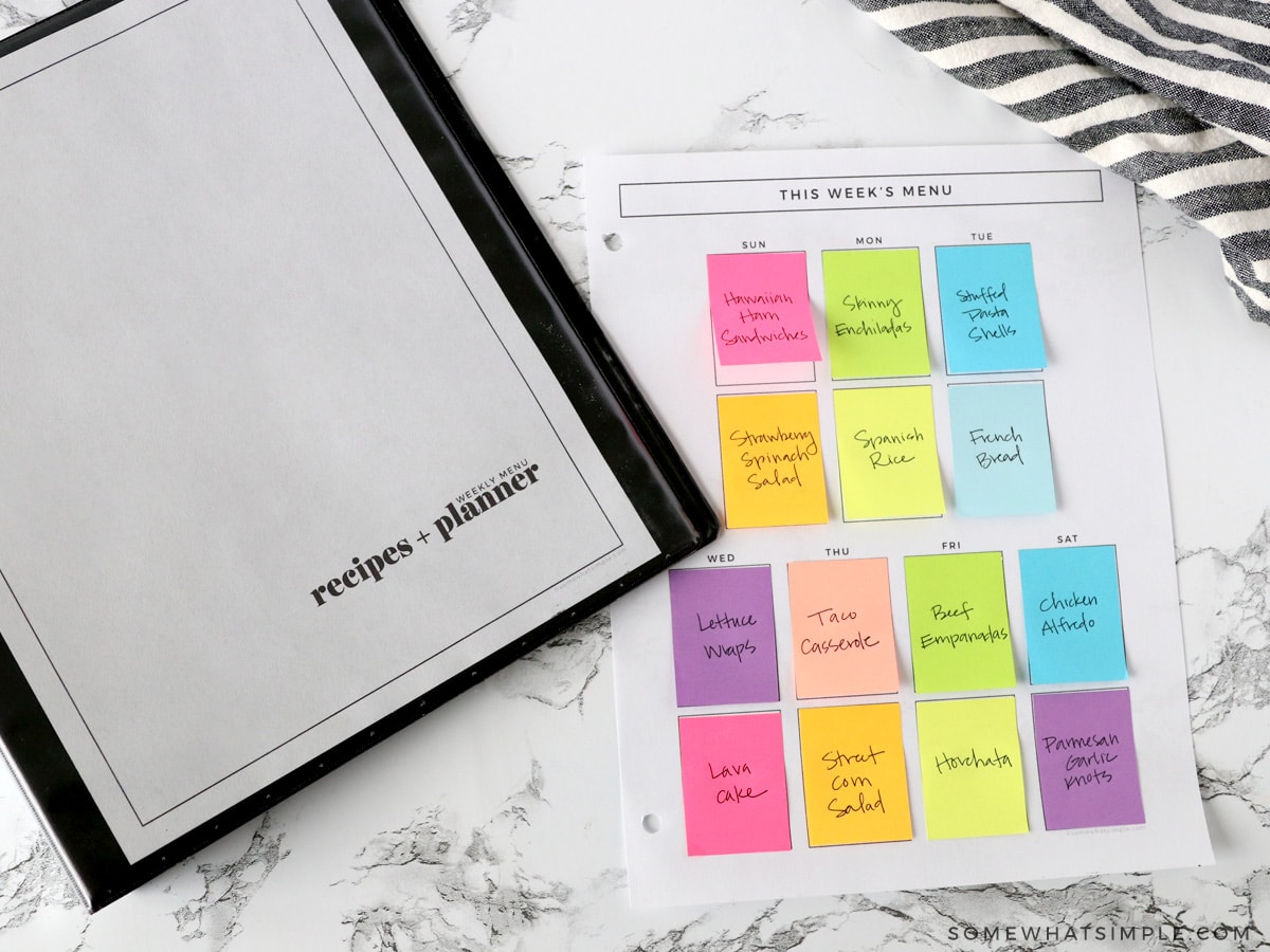 meal planning with a notebook and sticky notes