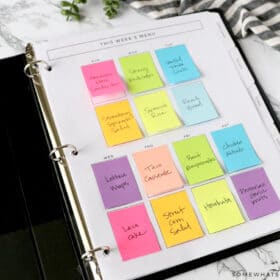 meal plan notebook with colorful post it notes