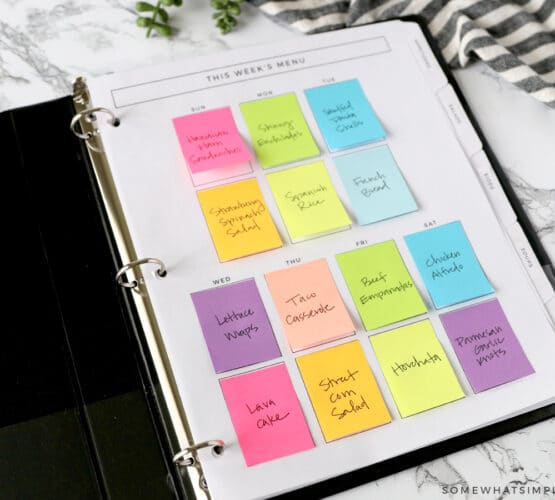 meal plan notebook with colorful post it notes