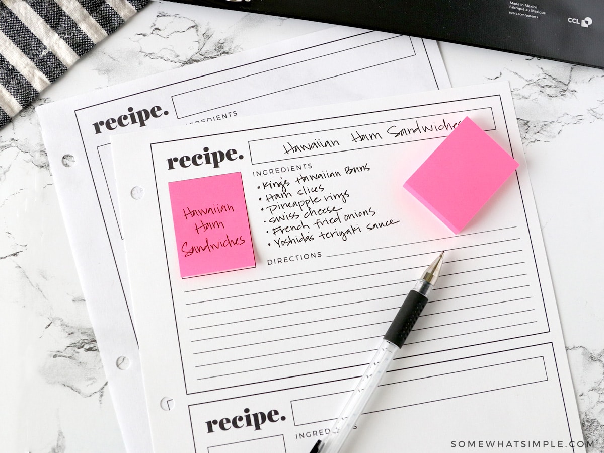 writing down recipes on a recipe card