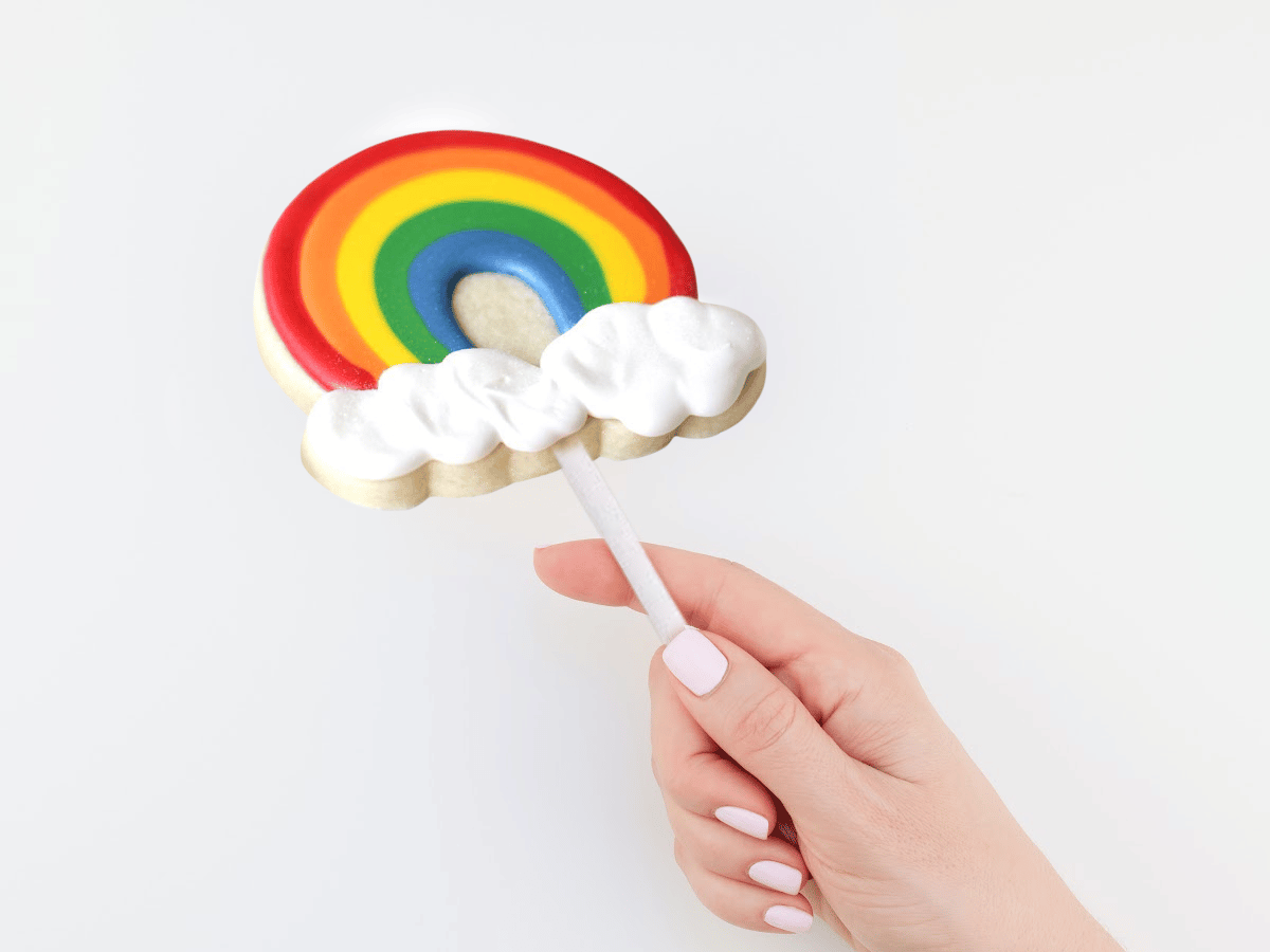 rainbow sugar cookie on a stick