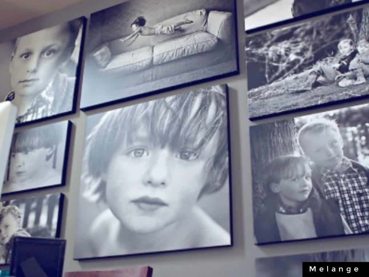 black and white pictures on canvas hung in a collage
