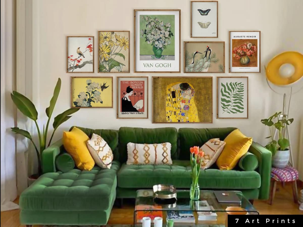 bright eclectic post prints behind a green velvet couch