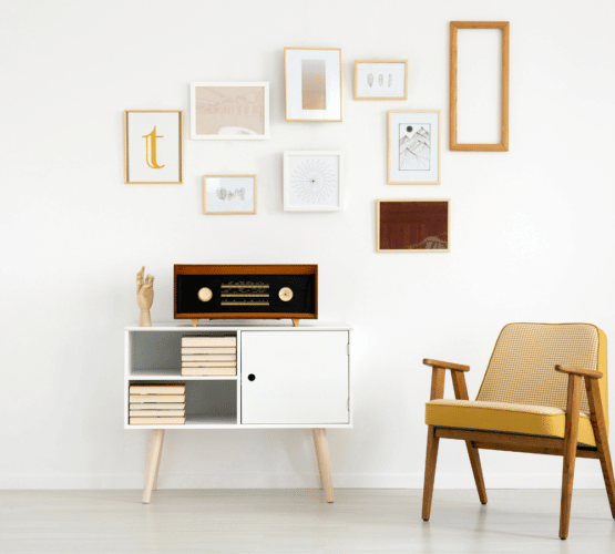 modern living room with collage on the wall above a vintage record player