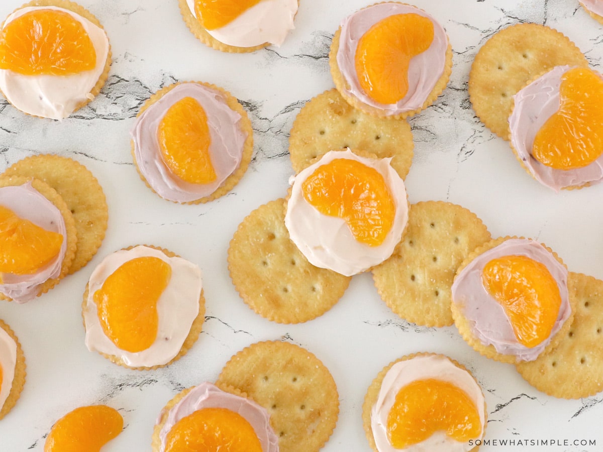 cream cheese crackers with mandarin oranges on top