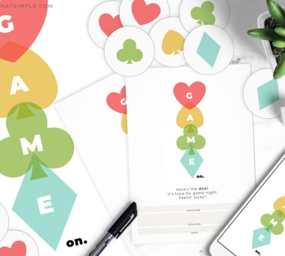 game night invites and party printables on a white counter