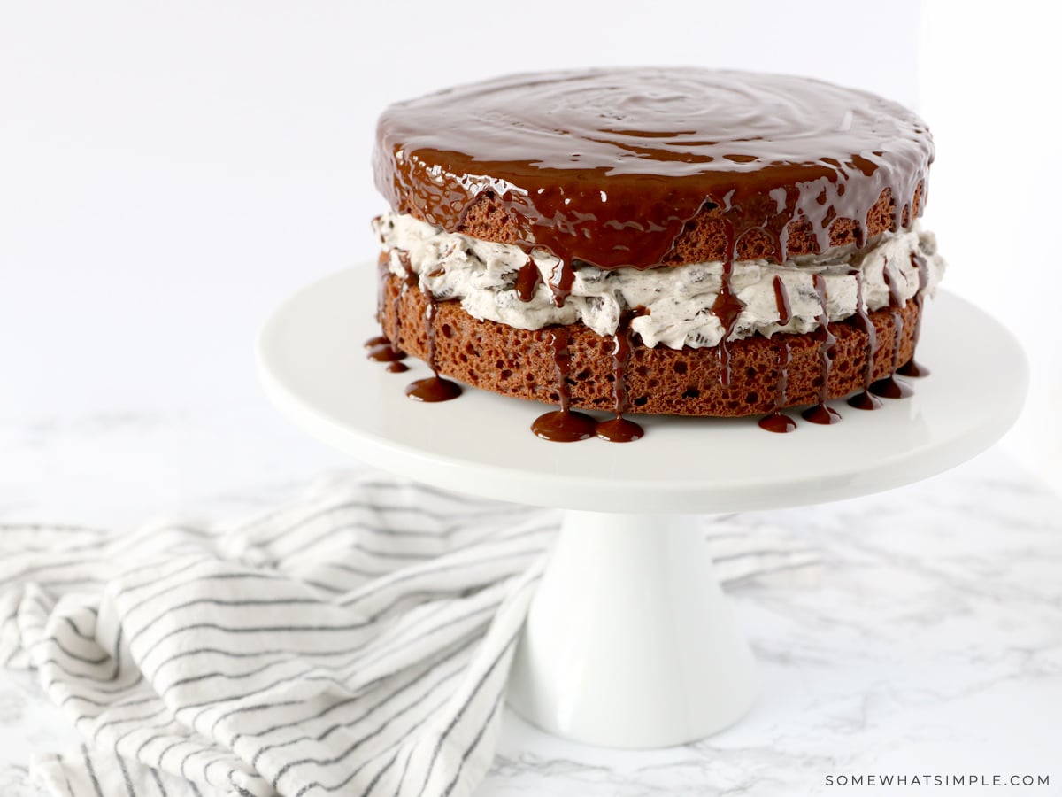 chocolate cake with melted chocolate dripping of the side